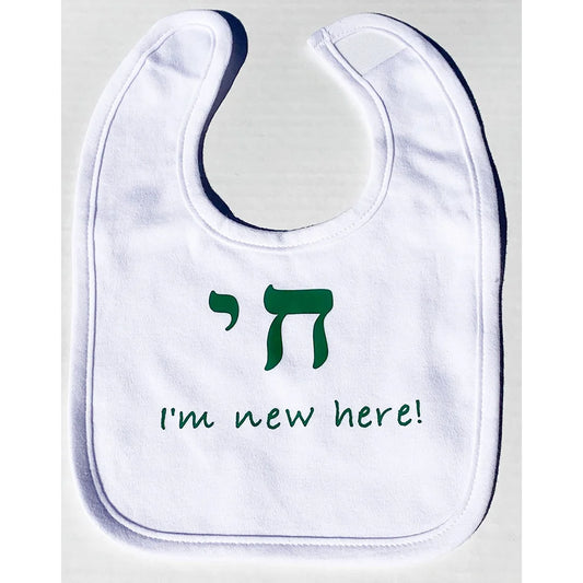 Judaica  Baby White Bib that says  Chai I’m New Here !